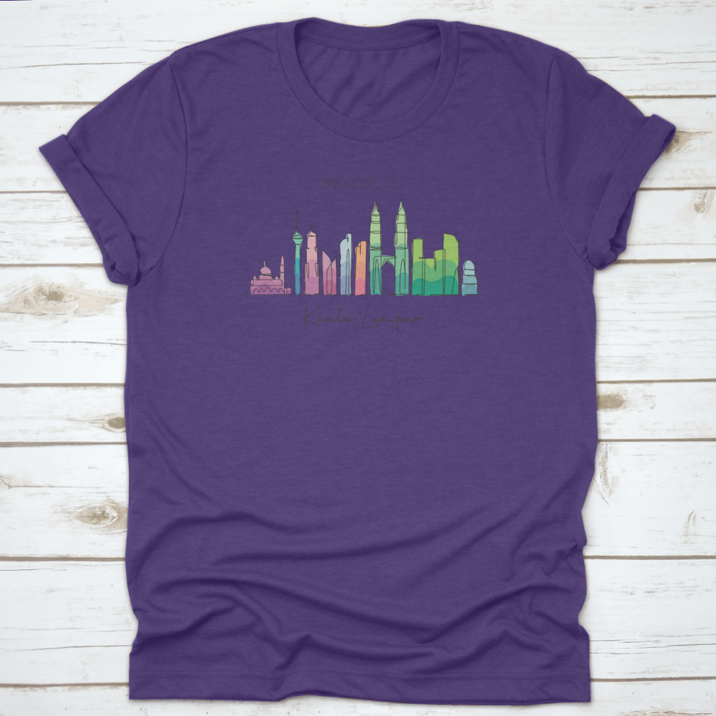 A stylish t-shirt featuring a minimalist single line drawing of the Kuala Lumpur city skyline, showcasing iconic buildings.
