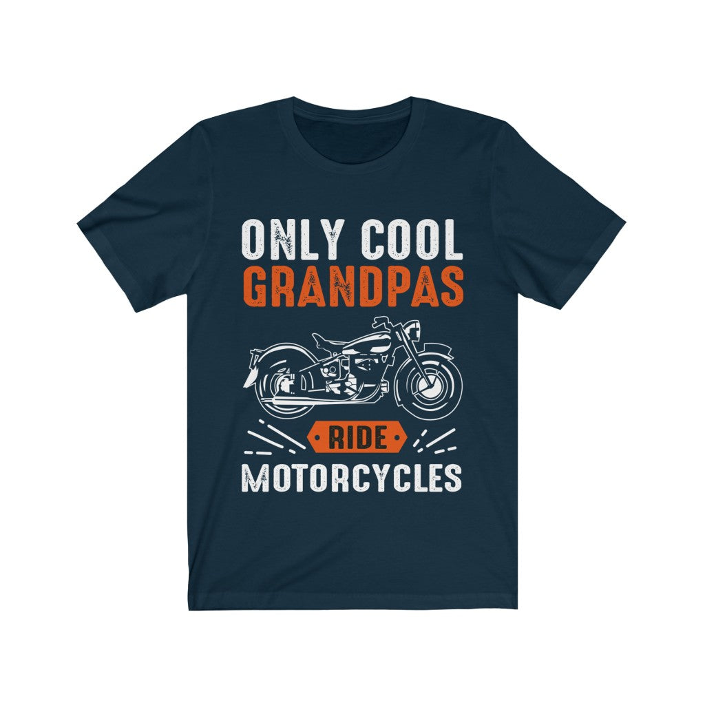 A soft cotton unisex t-shirt featuring the slogan 'Only Cool Grandpas Ride Motorcycles' in bold vinyl print, perfect for motorcycle enthusiasts.