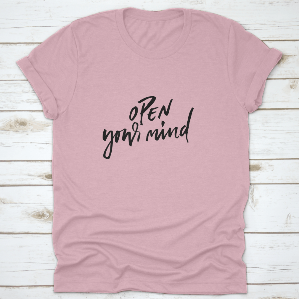 A motivational t-shirt featuring the quote 'Open Your Mind', made from soft cotton fabric, displayed on a neutral background.