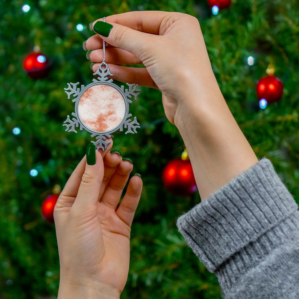 Orange Clouds Pewter Snowflake Ornament with vibrant colors and silver-toned hanging string, showcasing a unique snowflake design.