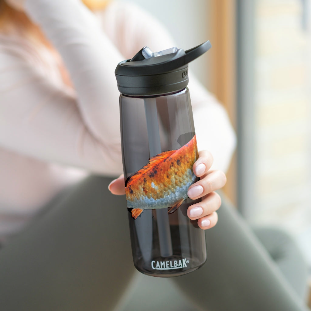Orange Fish CamelBak Eddy® Water Bottle in 20oz and 25oz sizes, showcasing its durable design and spill-proof valve.
