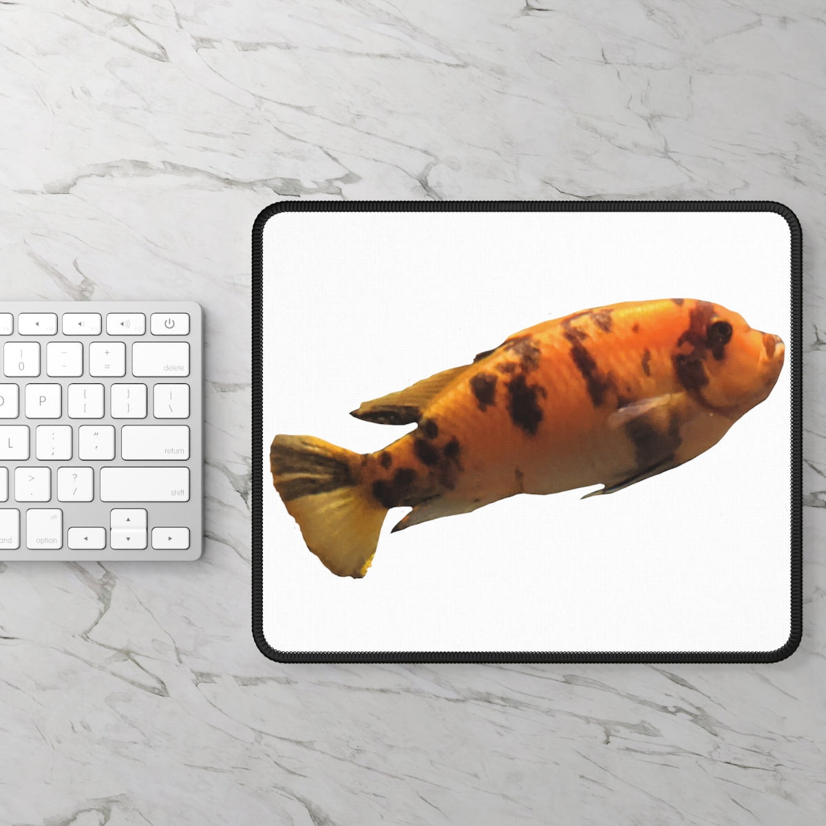 Orange Fish Gaming Mouse Pad featuring vibrant colors and stitched edges, ideal for gaming and work.