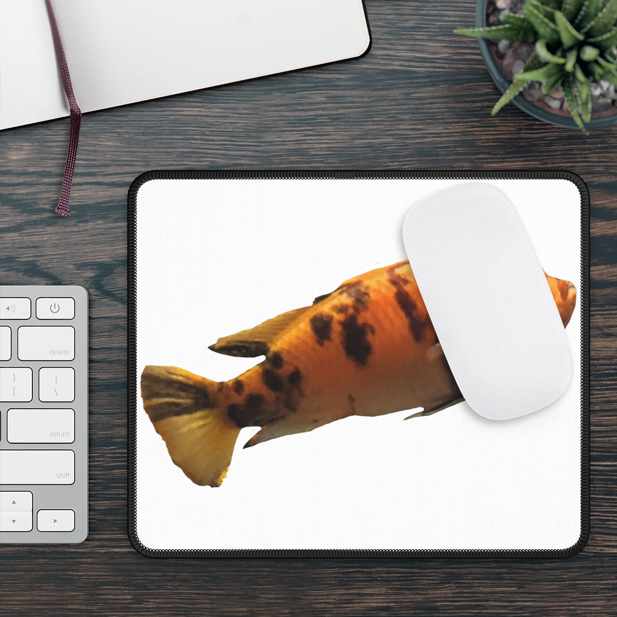 Orange Fish Gaming Mouse Pad featuring vibrant colors and stitched edges, ideal for gaming and work.