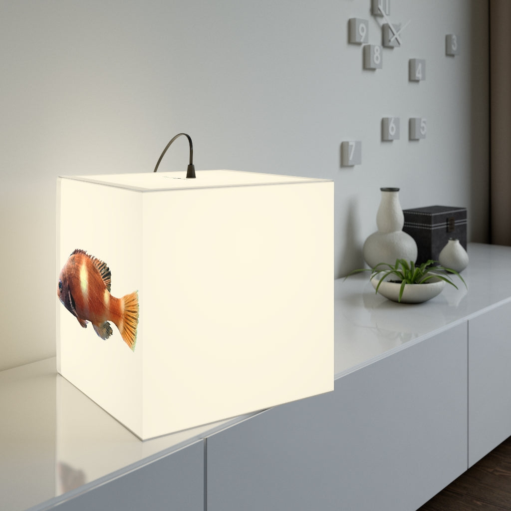A vibrant orange fish-themed personalized cube lamp, showcasing its unique design and glowing light, perfect for indoor decoration.