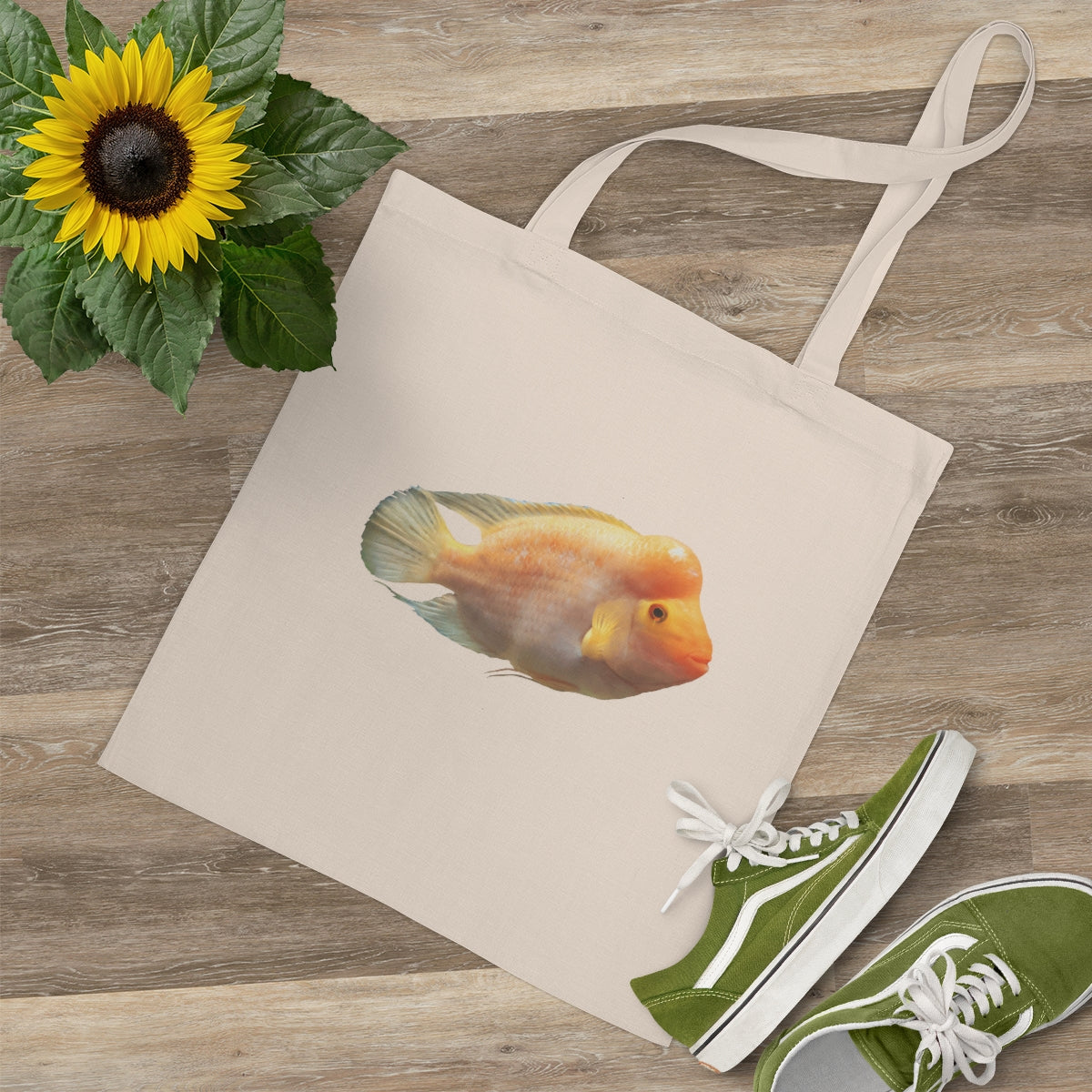 Orange Fish Tote Bag made of 100% cotton with cross-stitched handles, featuring a vibrant fish design.