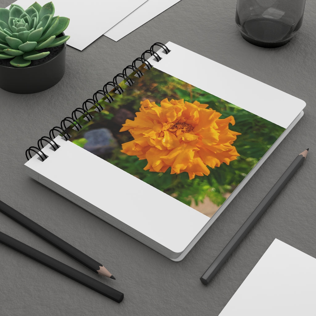 Orange Flower Spiral Bound Journal with glossy laminated cover and lined pages, perfect for writing dreams and ideas.