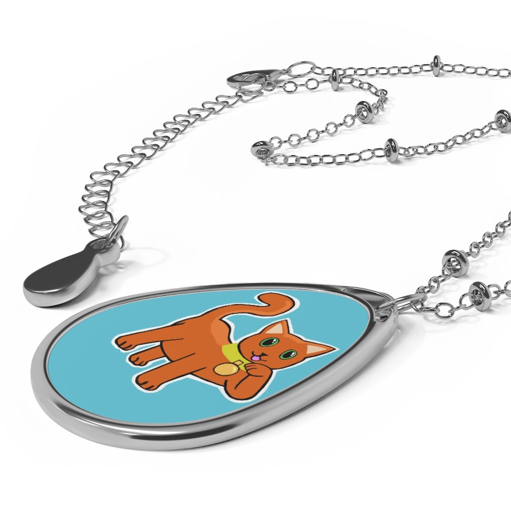 Orange Kitty Oval Necklace featuring a unique ellipse-shaped pendant made of brass and aluminum with a vibrant orange kitty design.