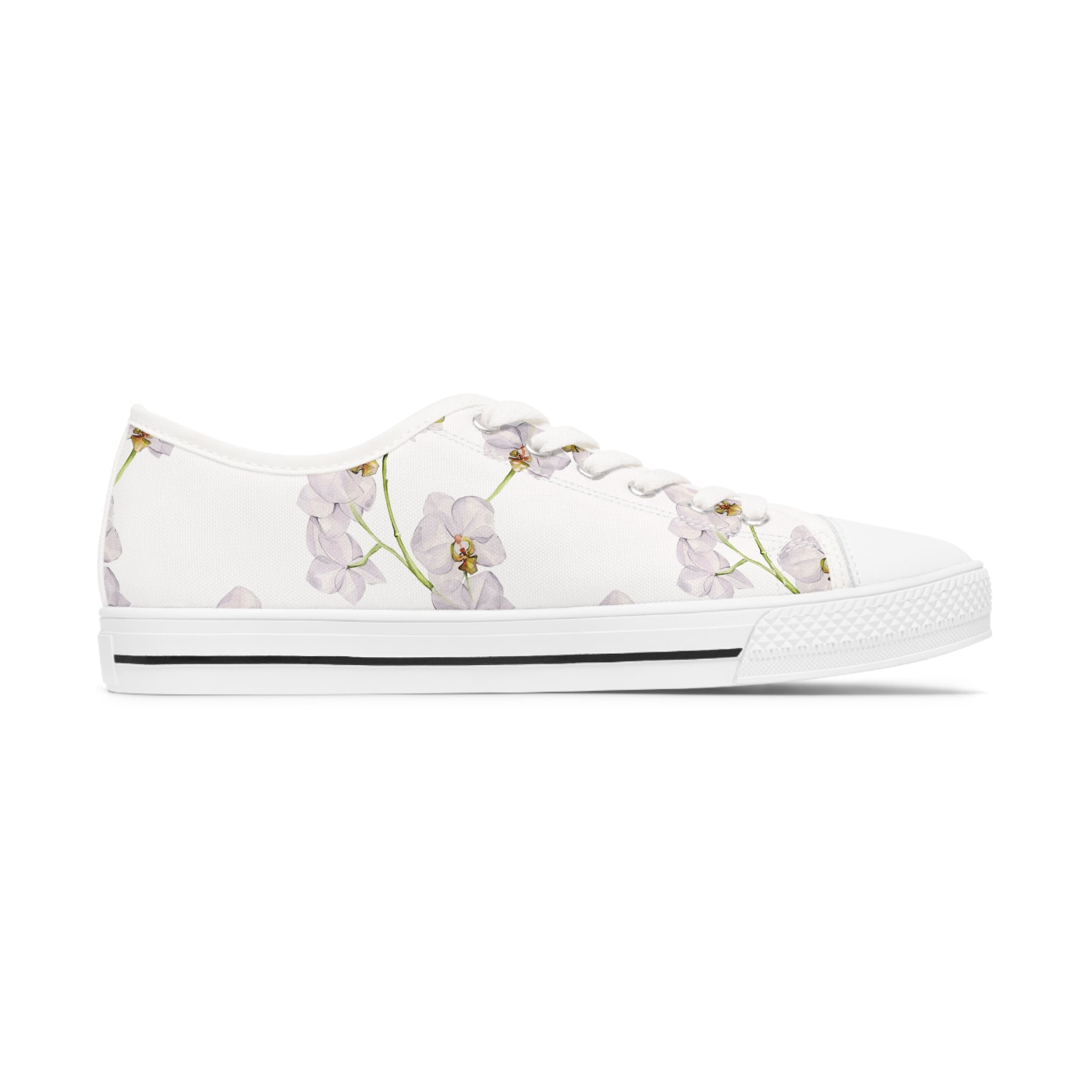 Orchid Women's Low Top Sneakers in black and white with silver metal eyelets, showcasing breathable canvas and customizable design.