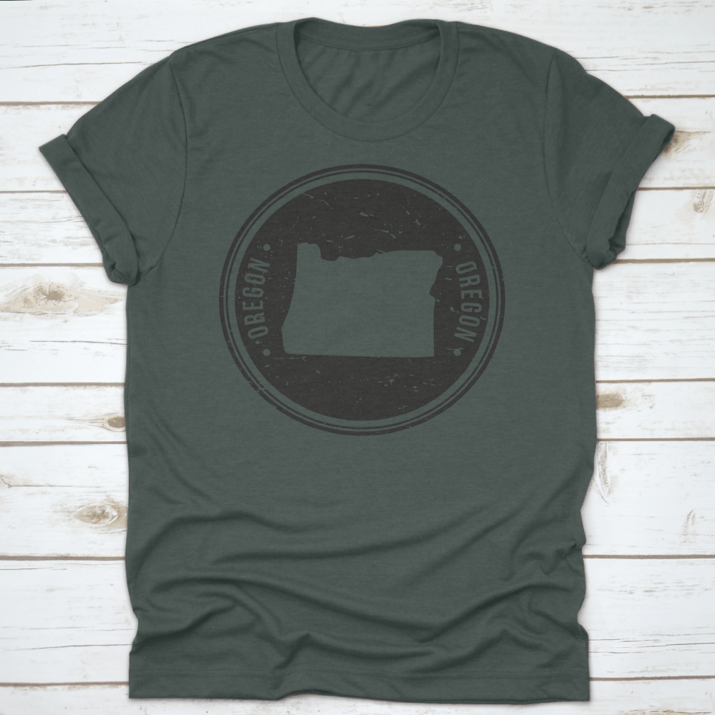 Oregon Map Symbol Round Design Stamp T-Shirt in Sport Grey, showcasing a unique map design.