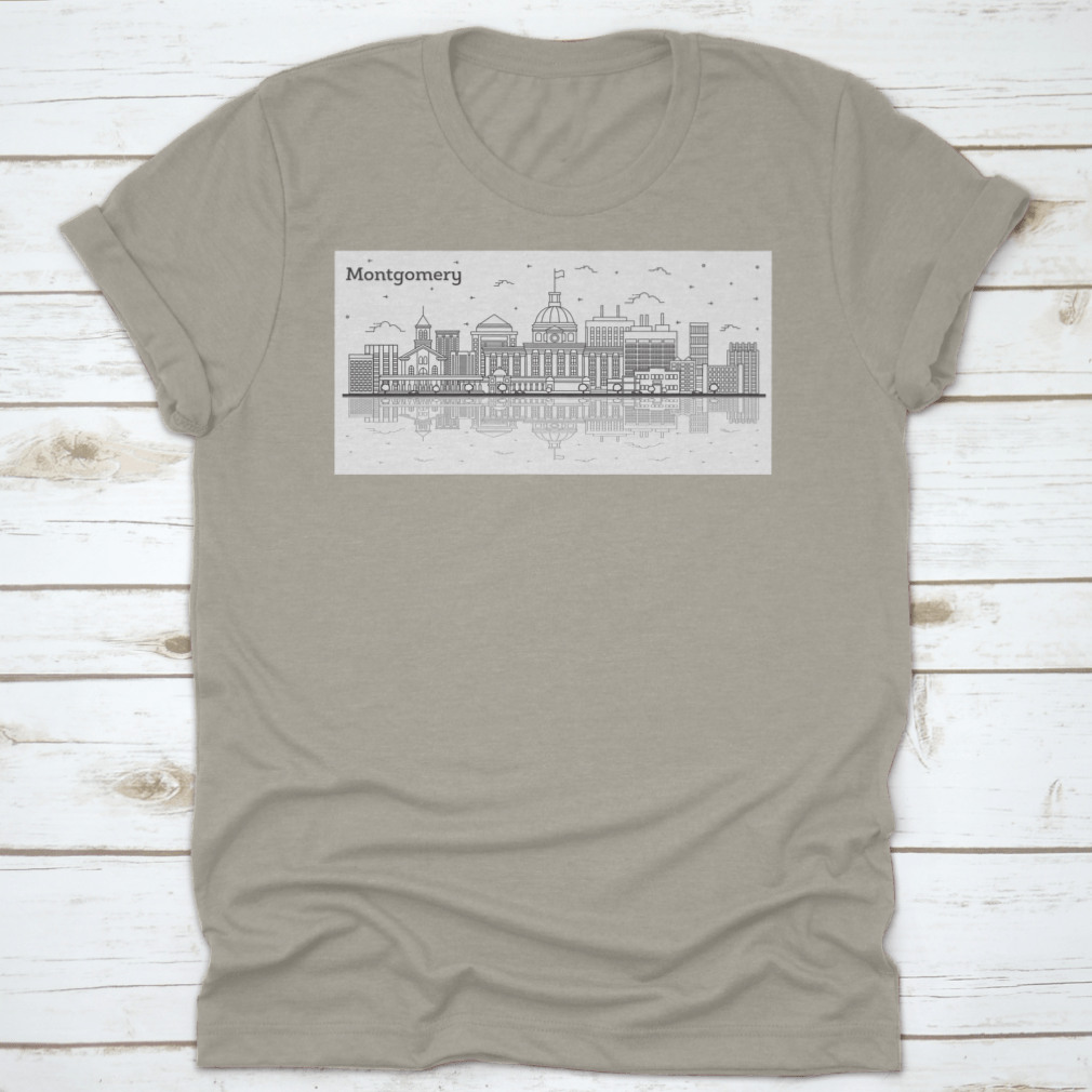 Outline of Montgomery Alabama city skyline featuring modern buildings on a stylish T-shirt.