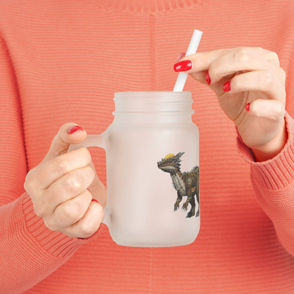 A frosted glass mason jar featuring a Pachycephalosaurus design, complete with a straw and lid, perfect for personalized drinks.