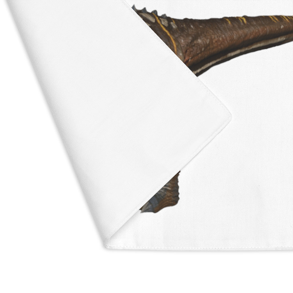 Pachycephalosaurus placemat featuring a vibrant dinosaur design on one side and a natural cotton back.