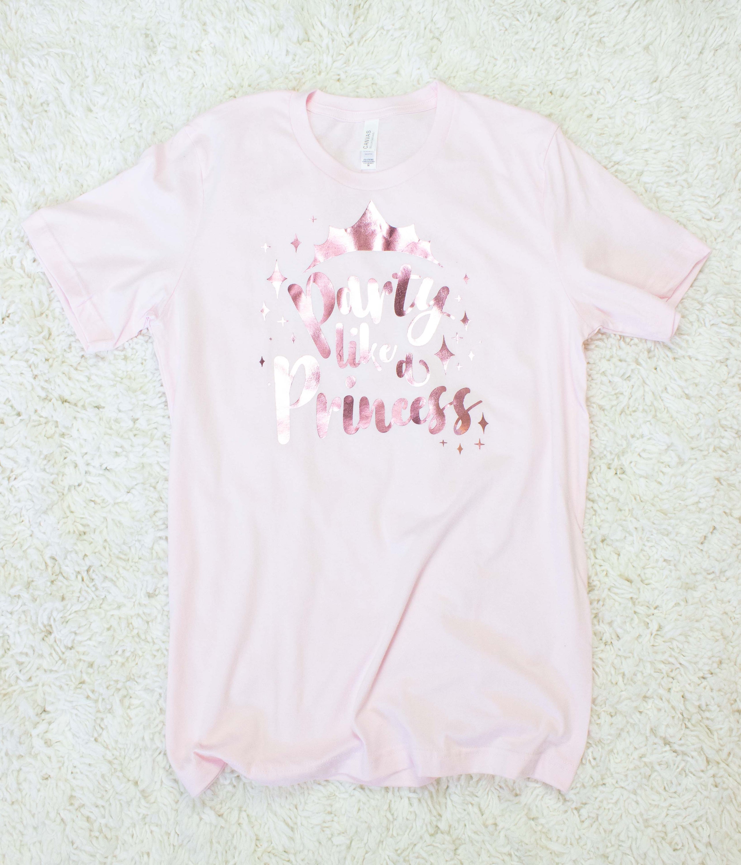 Party Like a Princess Shiny Foil T-Shirt in various colors, perfect for Disney trips and celebrations.