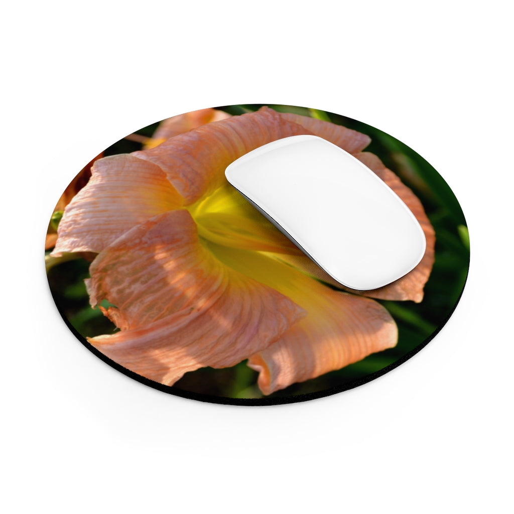 Peach and yellow flower mouse pad with vibrant floral design, available in round and rectangular shapes, featuring a non-slip rubber bottom.