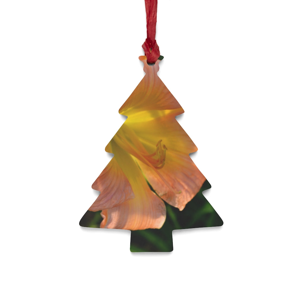 Peach and yellow flower wooden Christmas ornaments with red ribbons, showcasing whimsical shapes and a rustic design.