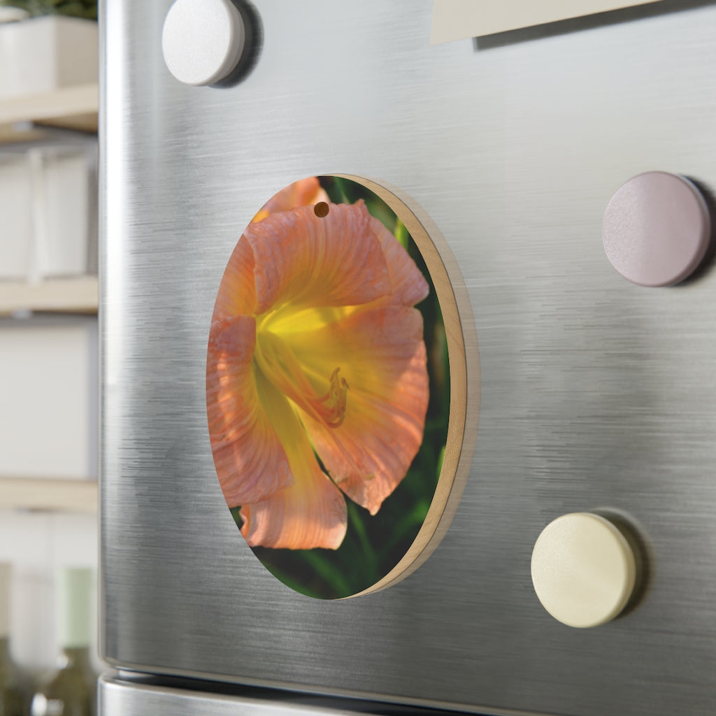 Peach and yellow flower wooden Christmas ornaments with red ribbons, showcasing whimsical shapes and a rustic design.