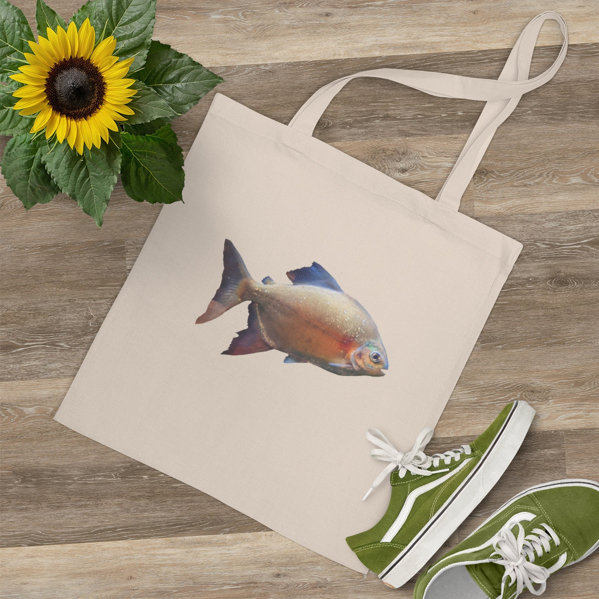 Peach Fish Tote Bag made of 100% cotton with long handles and cross-stitched design, available in multiple colors.