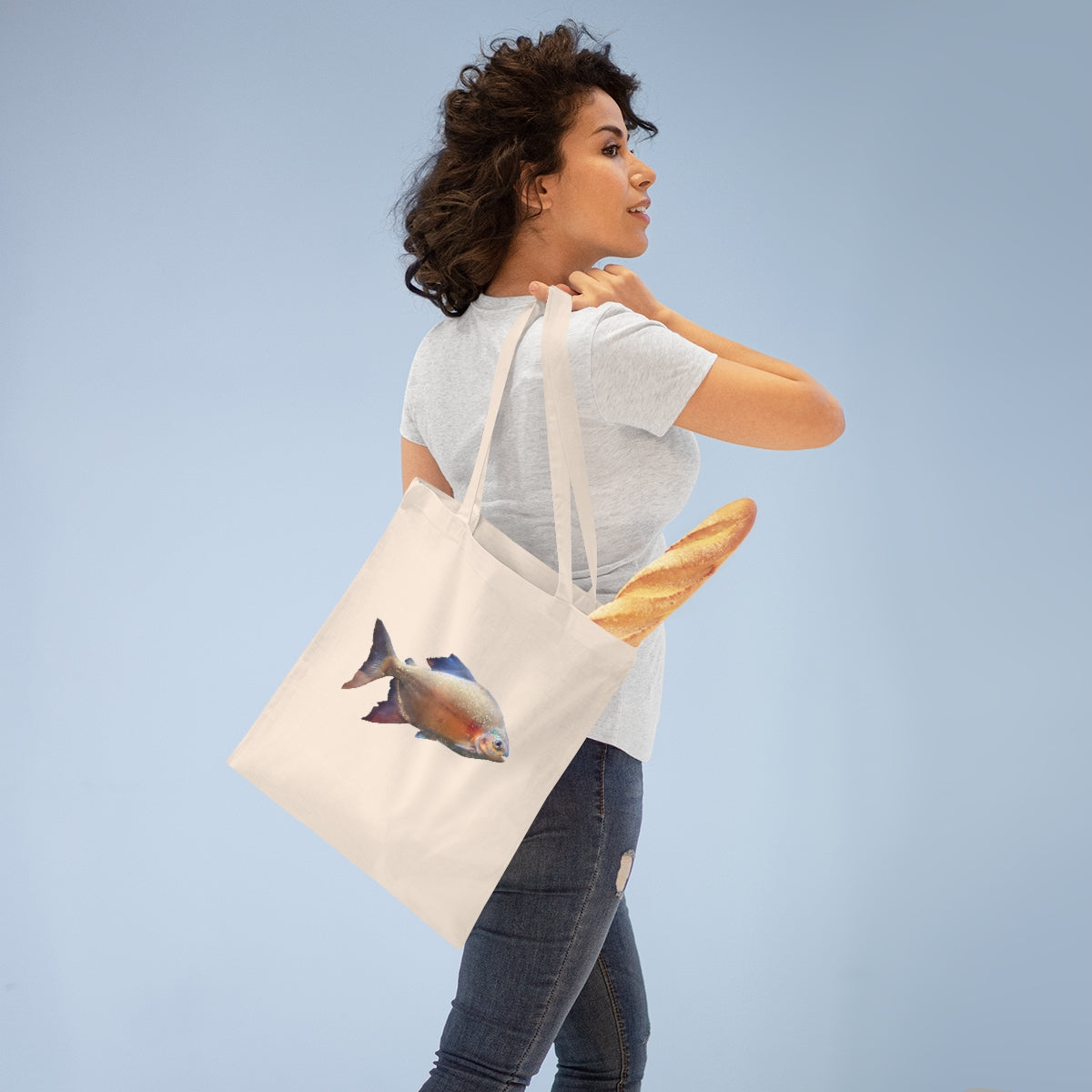 Peach Fish Tote Bag made of 100% cotton with long handles and cross-stitched design, available in multiple colors.