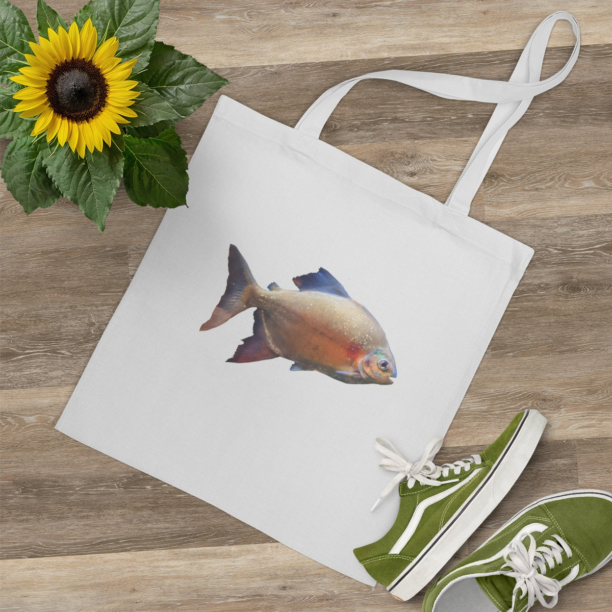 Peach Fish Tote Bag made of 100% cotton with long handles and cross-stitched design, available in multiple colors.