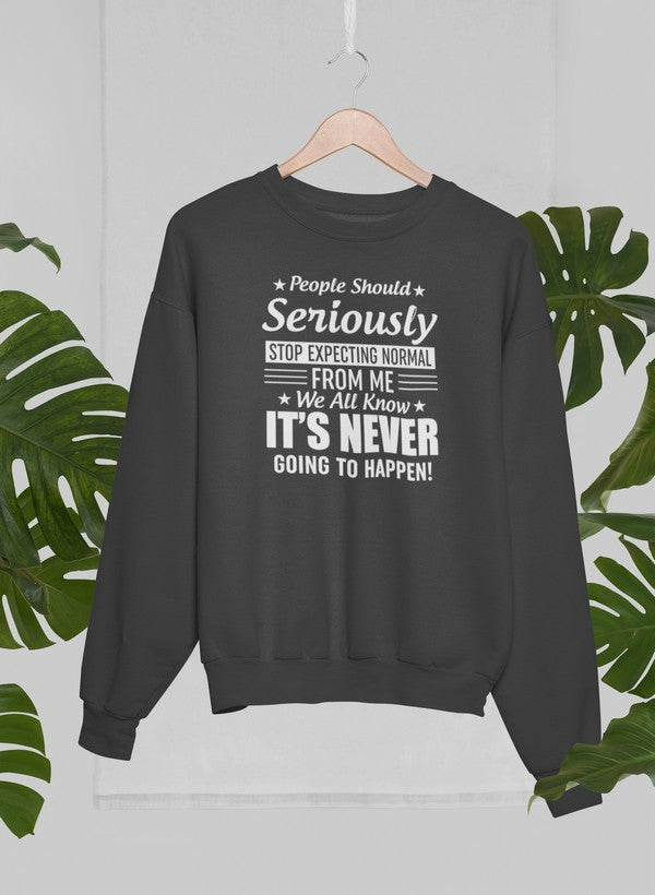 A cozy sweatshirt featuring the phrase 'People Should Seriously Stop Expecting Normal From Me', made from a soft cotton/poly fleece blend.