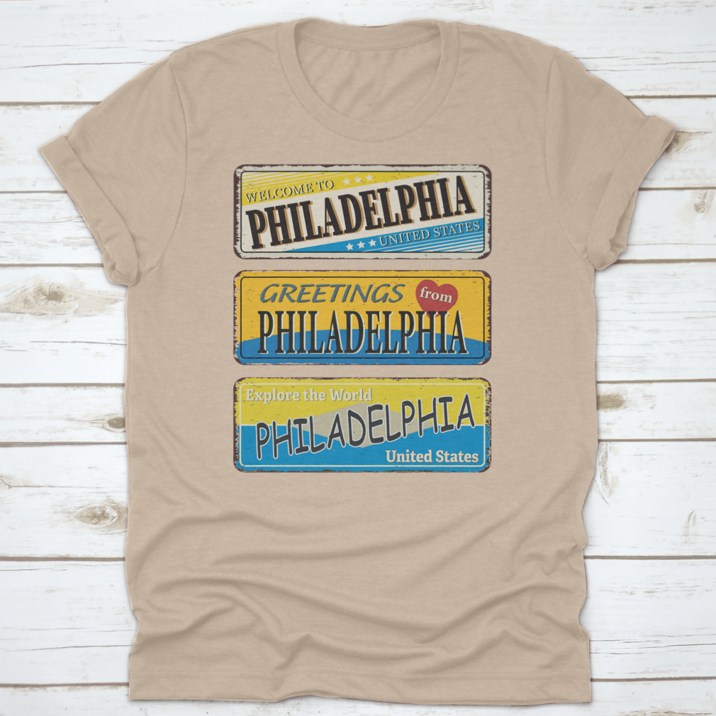 A collection of vintage tin signs featuring retro designs celebrating Philadelphia, showcasing iconic landmarks and city names.
