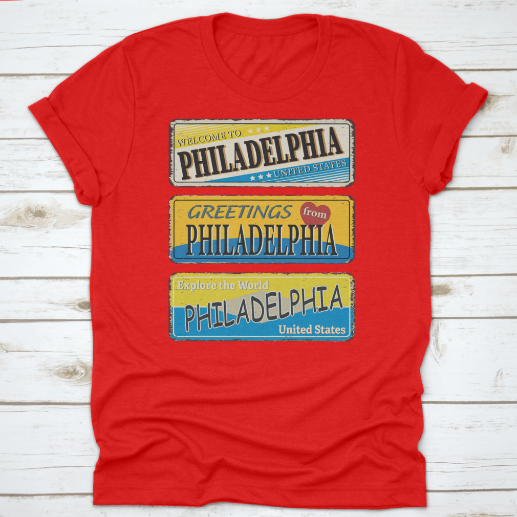 A collection of vintage tin signs featuring retro designs celebrating Philadelphia, showcasing iconic landmarks and city names.