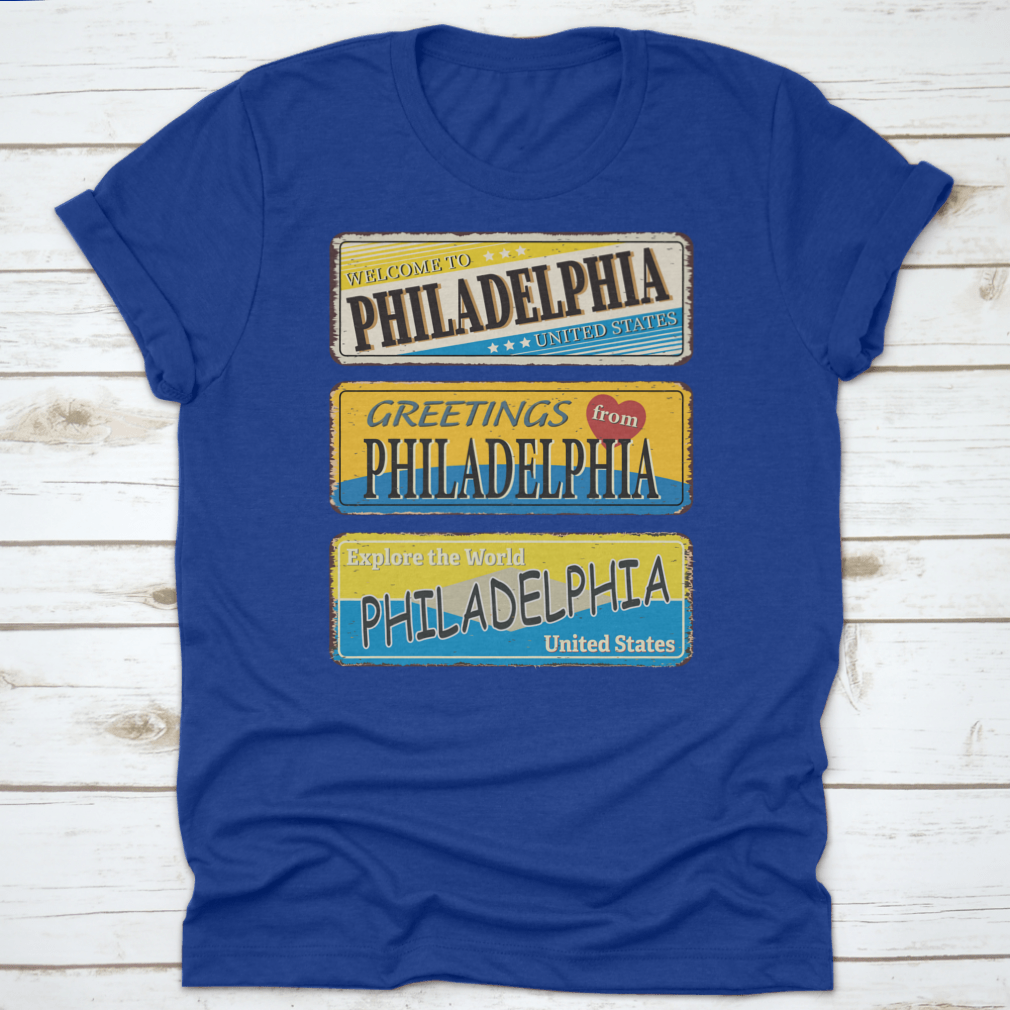 A collection of vintage tin signs featuring retro designs celebrating Philadelphia, showcasing iconic landmarks and city names.