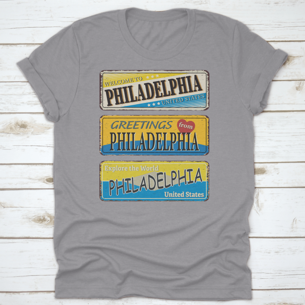 A collection of vintage tin signs featuring retro designs celebrating Philadelphia, showcasing iconic landmarks and city names.