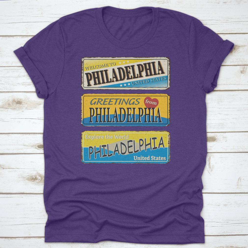 A collection of vintage tin signs featuring retro designs celebrating Philadelphia, showcasing iconic landmarks and city names.