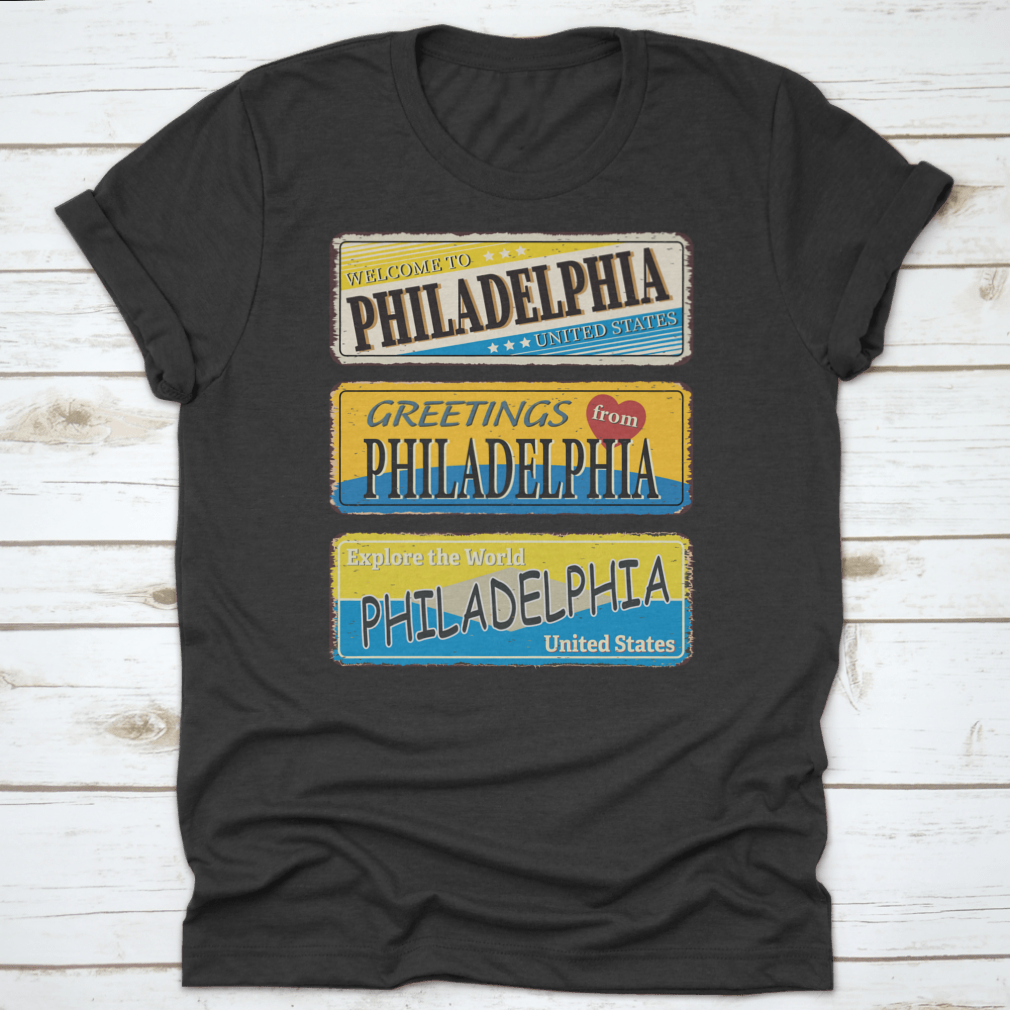A collection of vintage tin signs featuring retro designs celebrating Philadelphia, showcasing iconic landmarks and city names.
