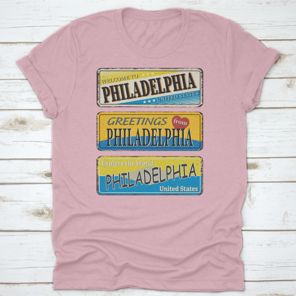 A collection of vintage tin signs featuring retro designs celebrating Philadelphia, showcasing iconic landmarks and city names.