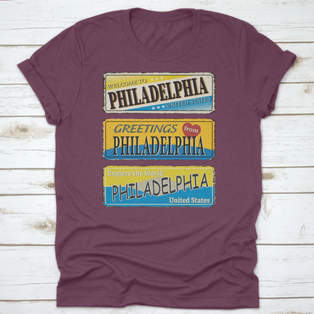 A collection of vintage tin signs featuring retro designs celebrating Philadelphia, showcasing iconic landmarks and city names.