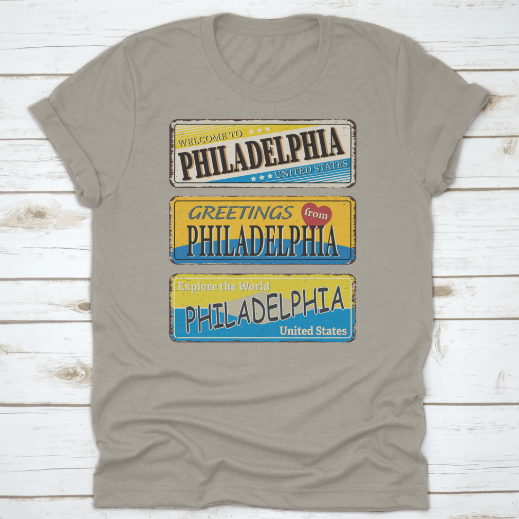 A collection of vintage tin signs featuring retro designs celebrating Philadelphia, showcasing iconic landmarks and city names.