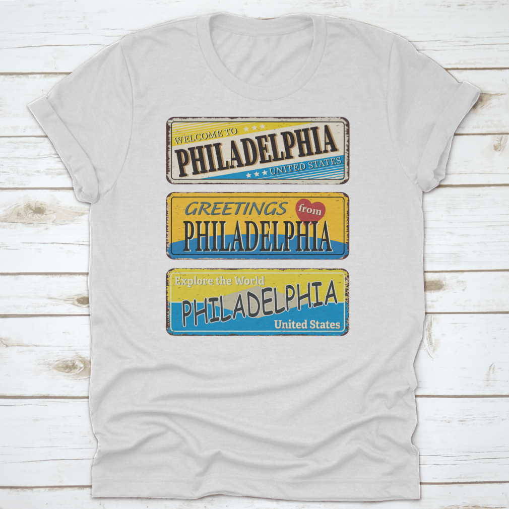 A collection of vintage tin signs featuring retro designs celebrating Philadelphia, showcasing iconic landmarks and city names.
