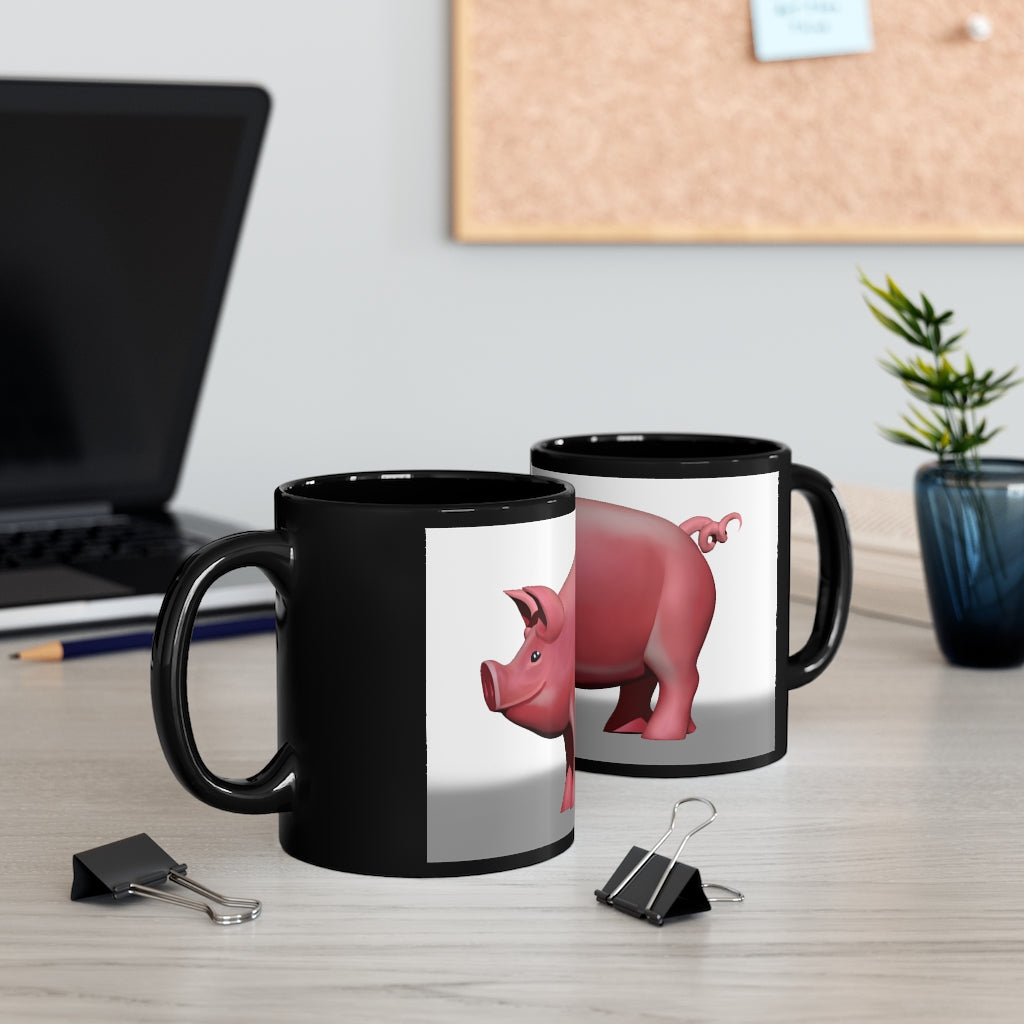 A stylish 11oz black ceramic mug with rounded corners and a comfortable C-handle, perfect for beverages.