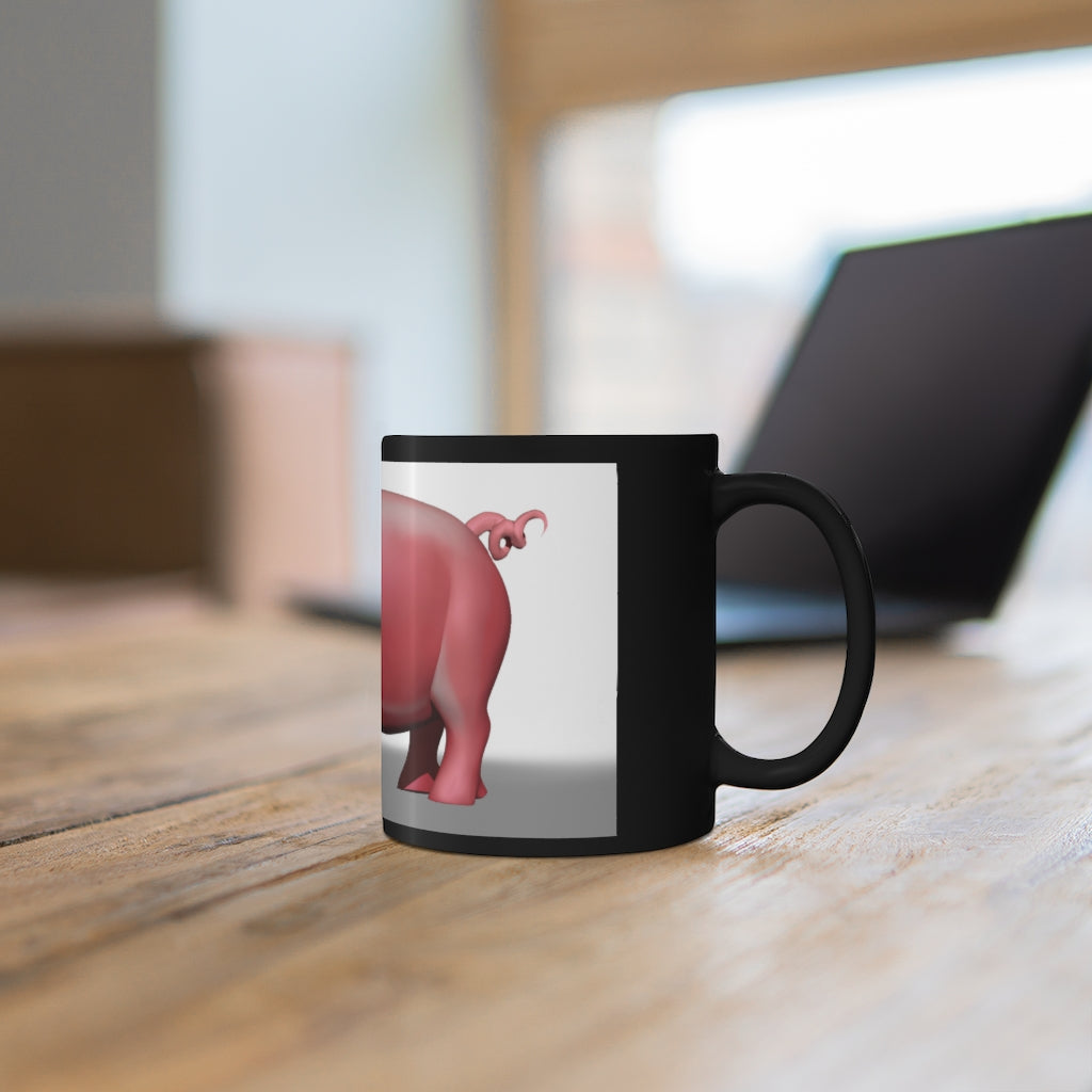 A stylish 11oz black ceramic mug with rounded corners and a comfortable C-handle, perfect for beverages.