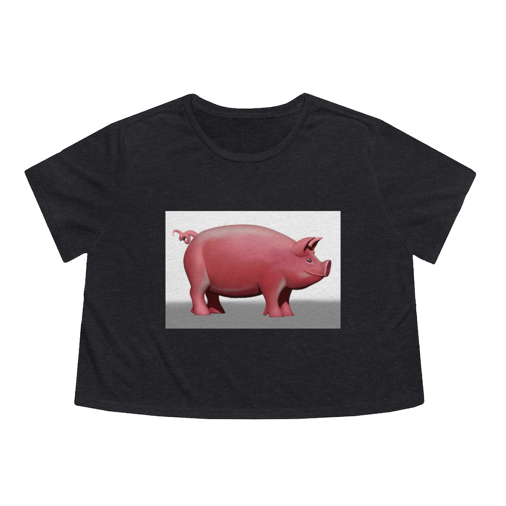 A stylish Pig Women's Flowy Cropped Tee in a light fabric, showcasing its modest crop and flowy fit, perfect for personalized designs.
