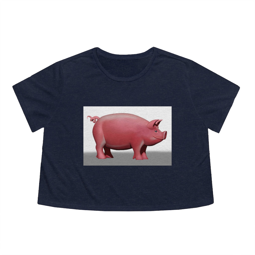 A stylish Pig Women's Flowy Cropped Tee in a light fabric, showcasing its modest crop and flowy fit, perfect for personalized designs.