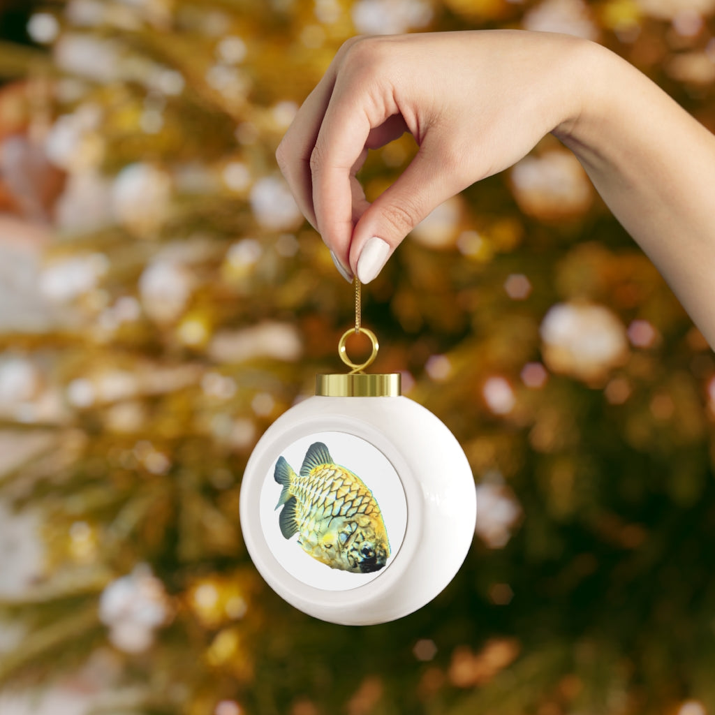 A beautifully designed Pineapple Fish Christmas Ball Ornament with a glossy finish and gold ribbon, perfect for holiday decorating.