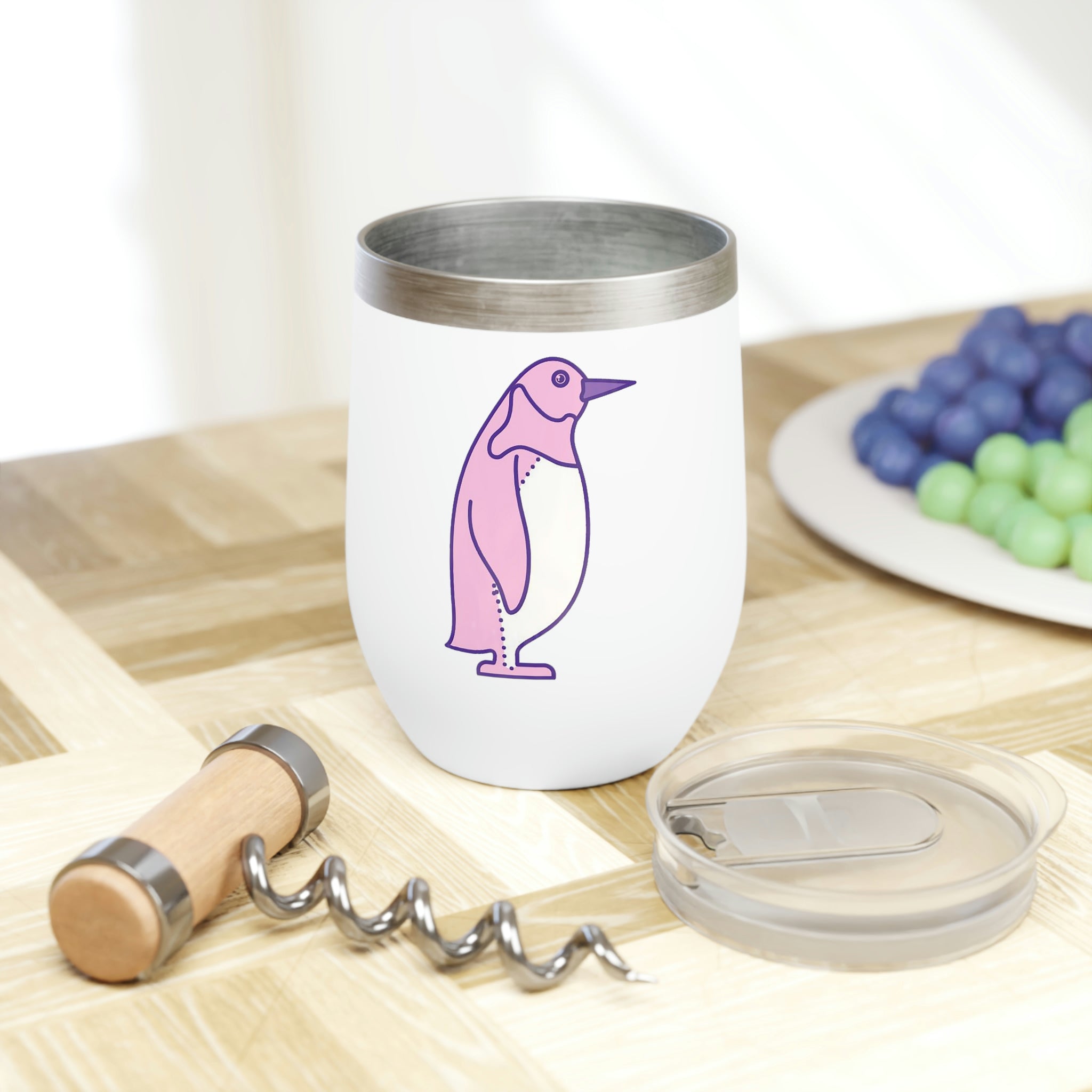 A stylish pink and purple bird wine tumbler with a double-insulated design, perfect for keeping drinks at the ideal temperature.