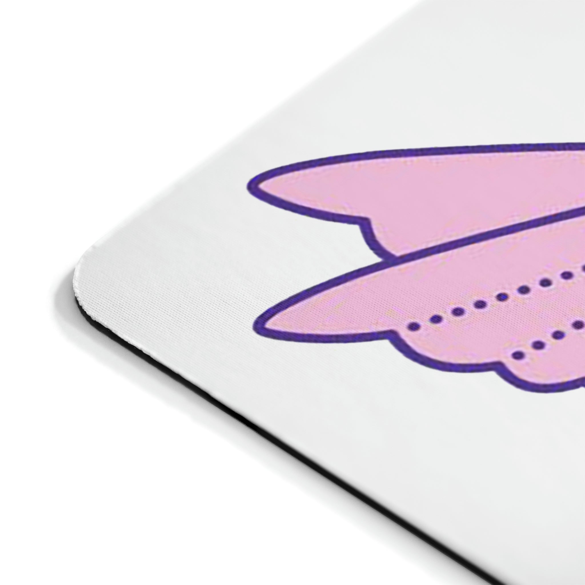 A vibrant pink and purple bird mouse pad featuring a colorful design, perfect for enhancing any workspace.