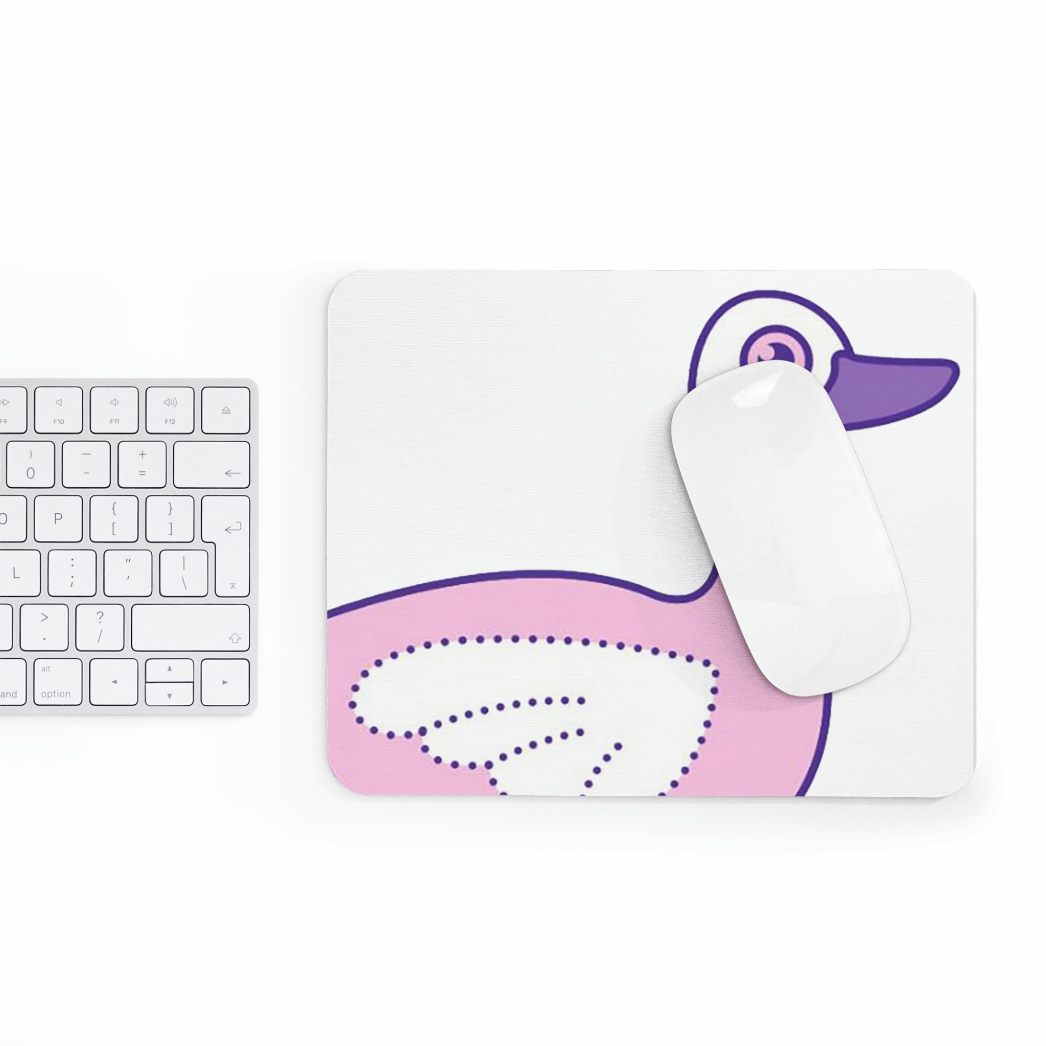 A vibrant pink and purple bird mouse pad featuring a whimsical bird design, perfect for enhancing any workspace.
