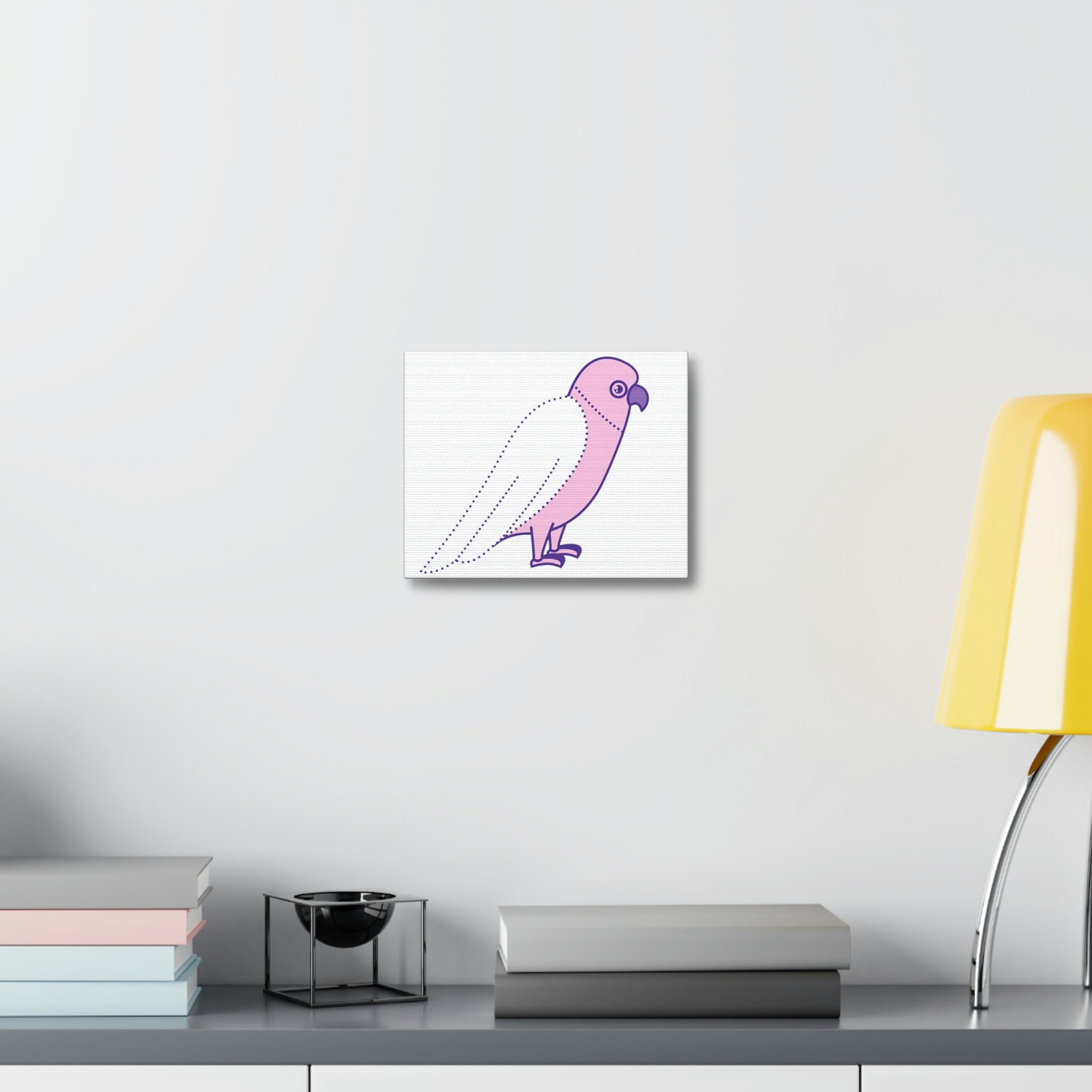 A vibrant stretched canvas featuring a pink and purple bird design, elegantly framed and ready for indoor display.