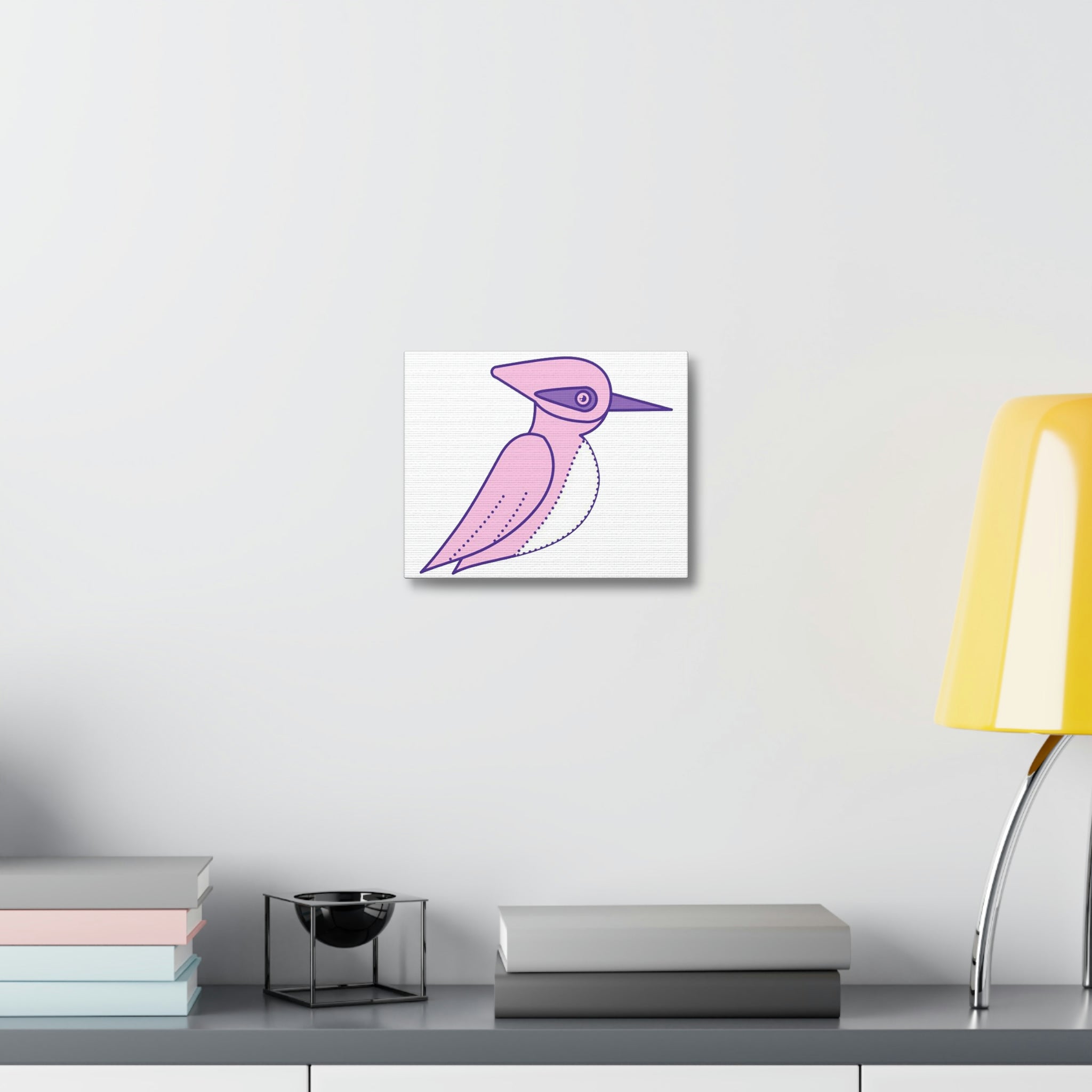 A vibrant pink and purple bird canvas stretched on a wooden frame, showcasing intricate details and colors.