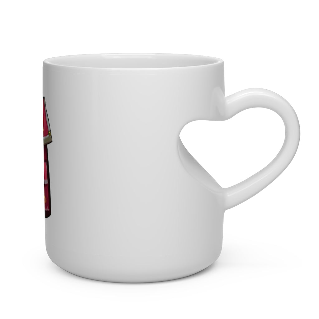 A charming pink bag heart-shaped mug made of white ceramic, featuring a heart-shaped handle and round corners, perfect for hot beverages.