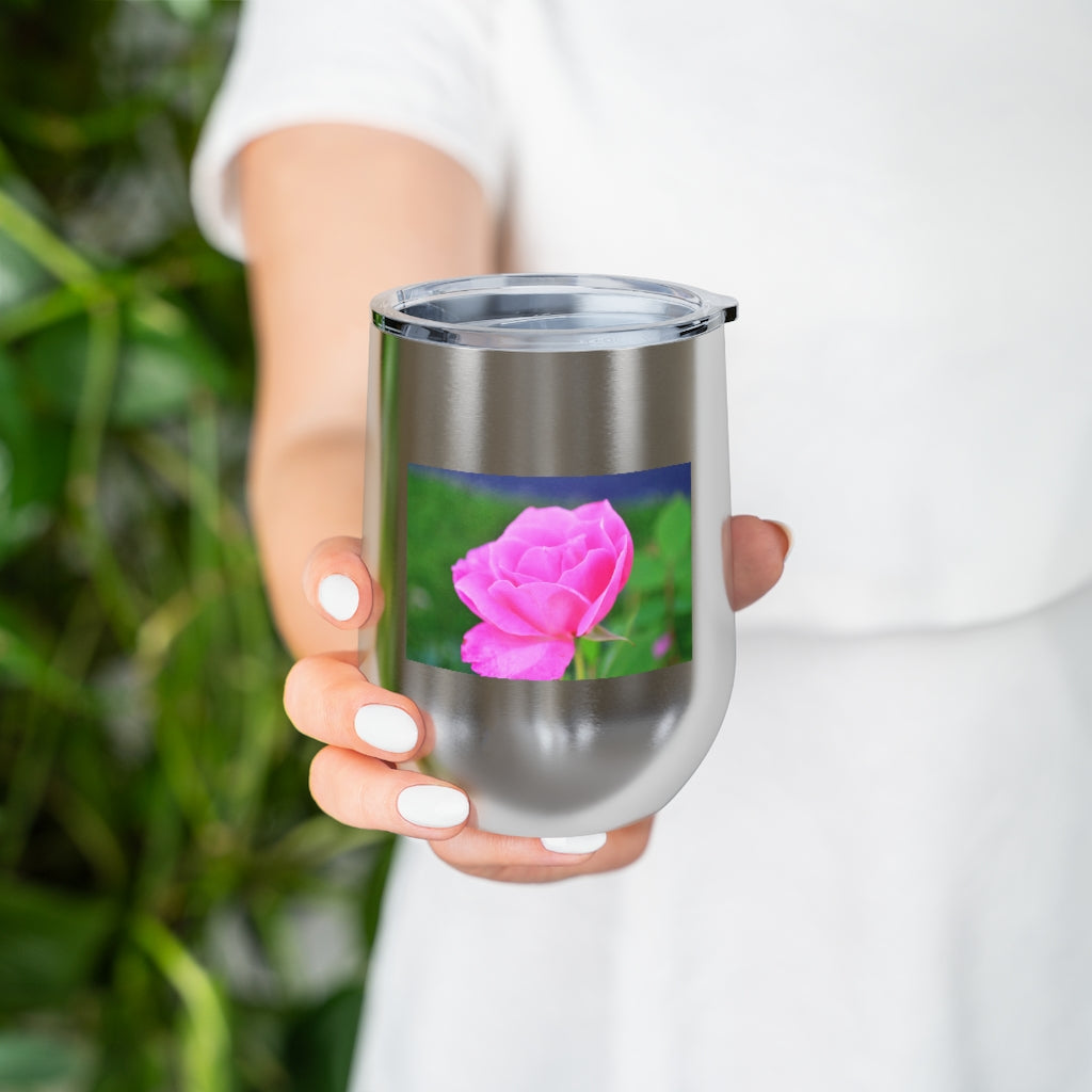 A stylish Pink Flower 12oz Insulated Wine Tumbler with a clear lid, showcasing a vibrant floral design.