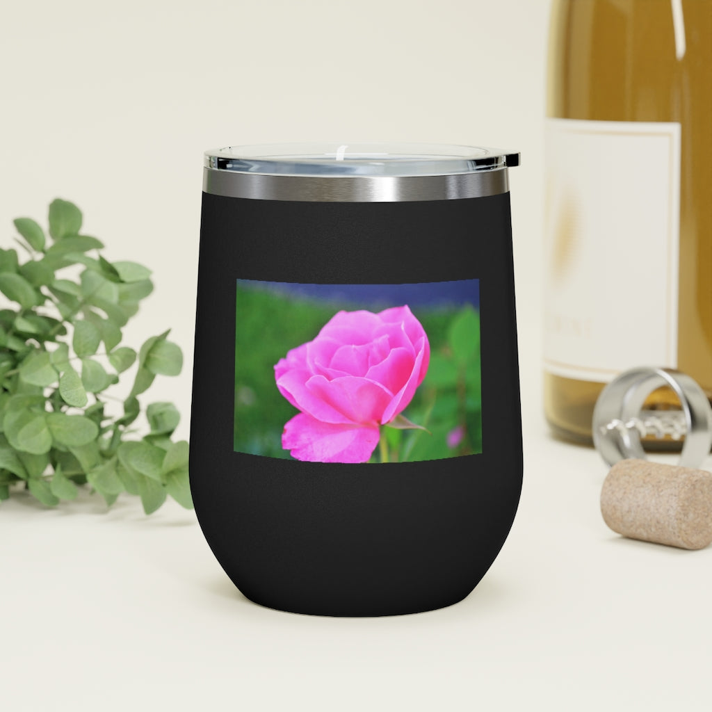 A stylish Pink Flower 12oz Insulated Wine Tumbler with a clear lid, showcasing a vibrant floral design.