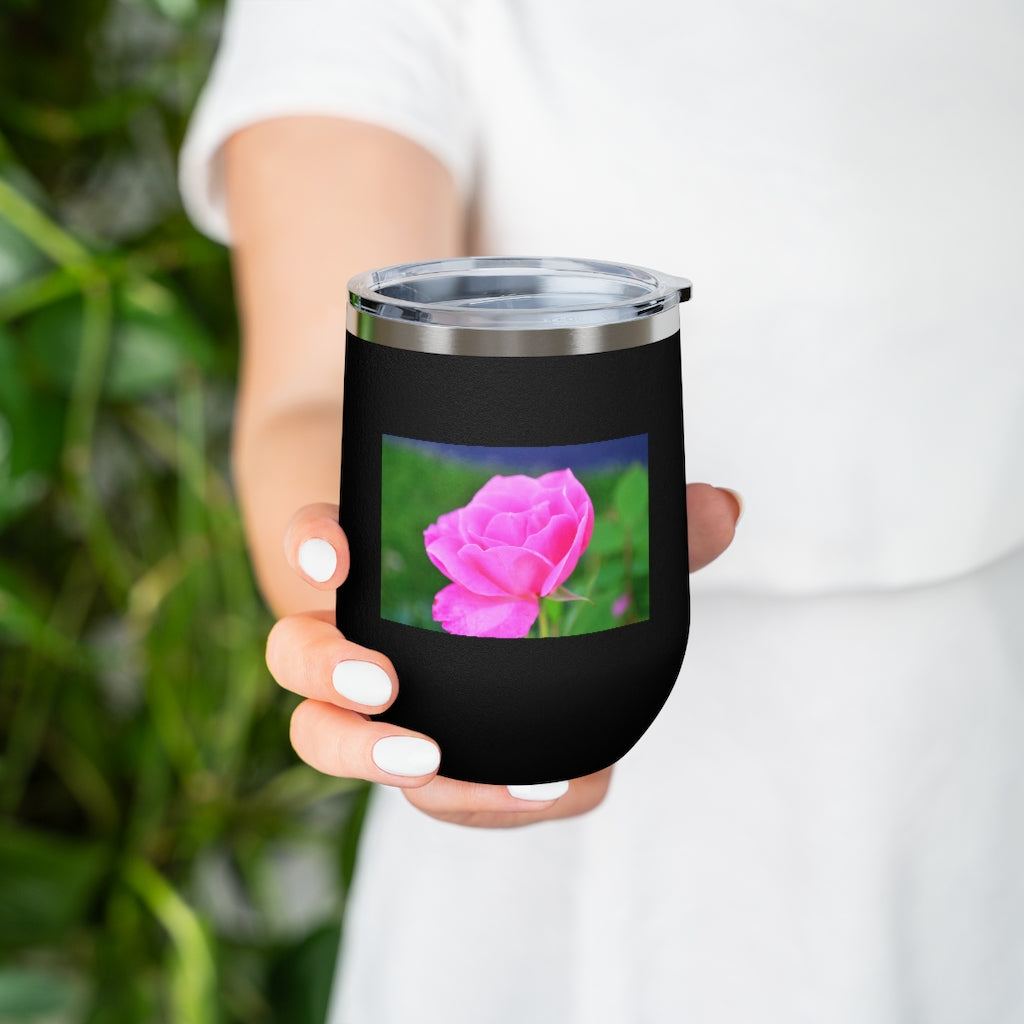 A stylish Pink Flower 12oz Insulated Wine Tumbler with a clear lid, showcasing a vibrant floral design.