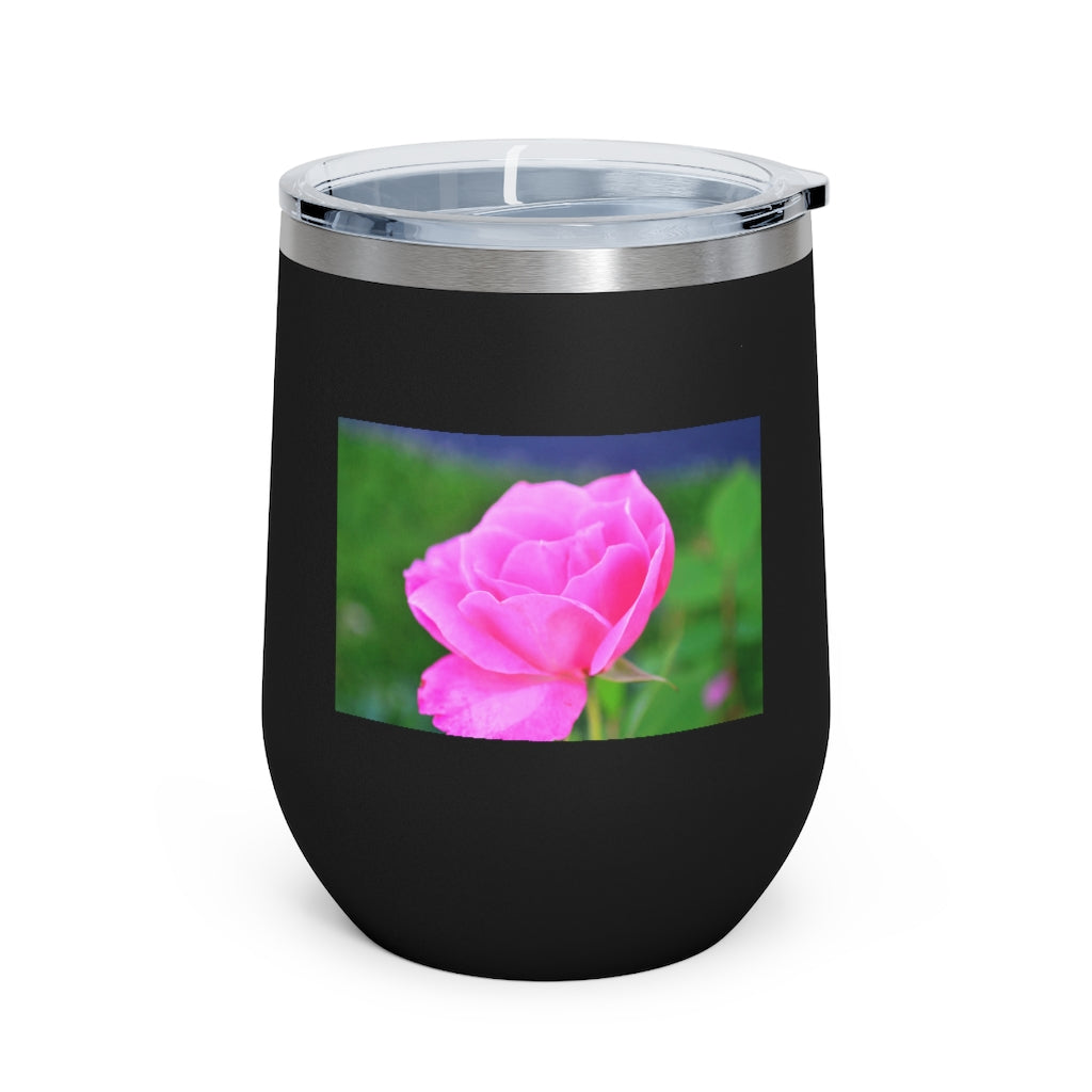 A stylish Pink Flower 12oz Insulated Wine Tumbler with a clear lid, showcasing a vibrant floral design.