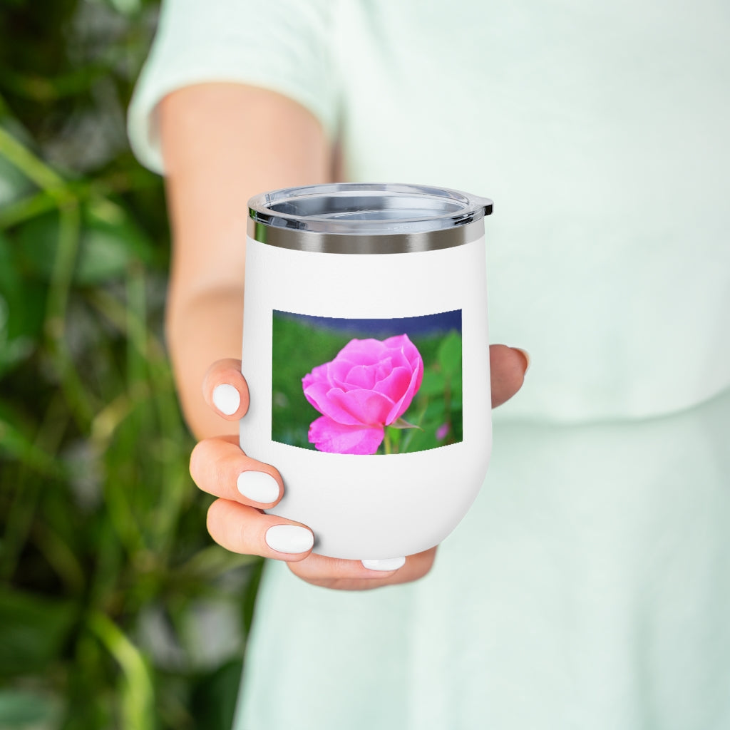 A stylish Pink Flower 12oz Insulated Wine Tumbler with a clear lid, showcasing a vibrant floral design.